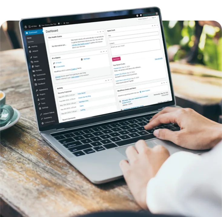 Laptop showing a WordPress website dashboard